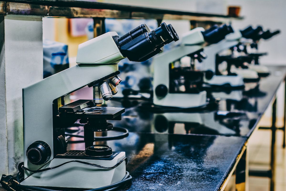 Microscopes on a laboratory bench at Rugvediya Laboratories